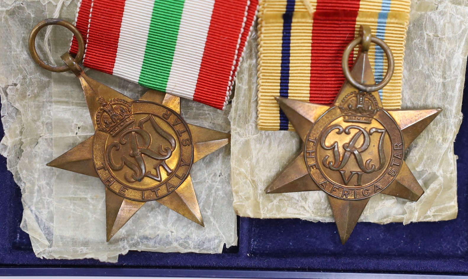 A WWII group of 5 including war medal with oak leaf and 1939-45 star with oak leaf to L.E. TYLER, 8th Army bar (with named box)